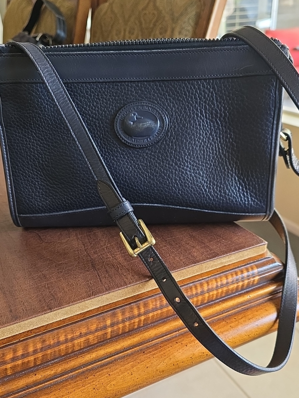 Vintage Dooney & Bourke Navy Pebbled Leather Crossbody Bag with Brass Hardware